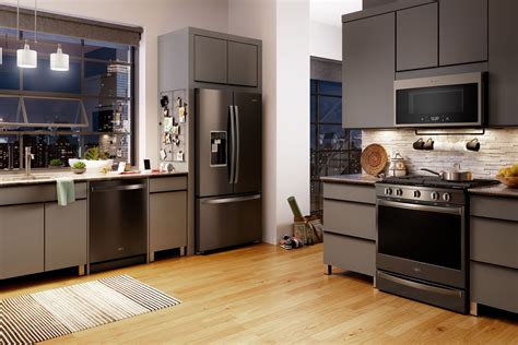 black stainless steel appliances with dark wood cabinets|kitchens with black stainless appliances.